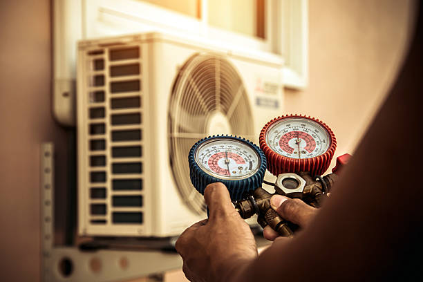 Professional Air Conditioning Service technician working in Little River, SC